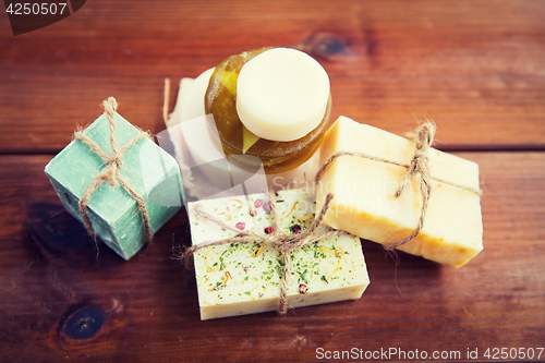 Image of close up of handmade soap bars on wood