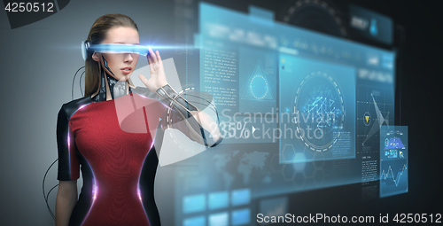 Image of woman in virtual reality glasses and microchip