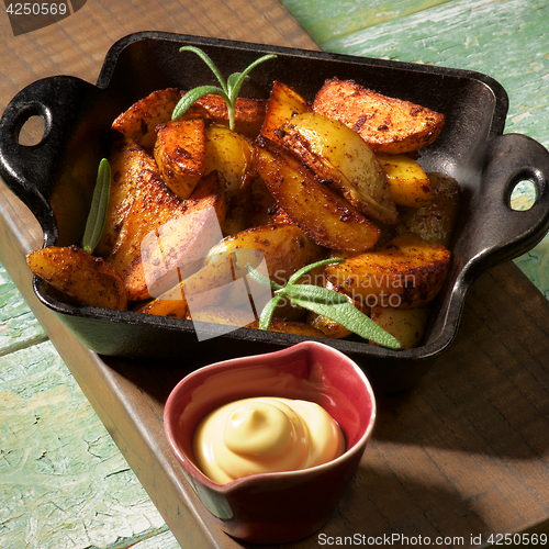 Image of Potato Wedges and Cheese Sauce