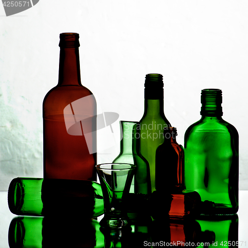 Image of Empty Bottles and Glasses