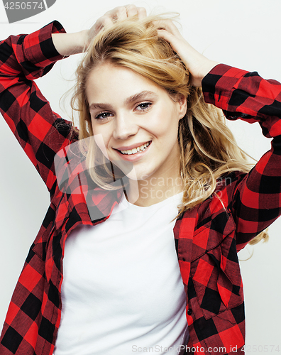 Image of young pretty teenage hipster girl posing emotional happy smiling on white background, lifestyle people concept closeup