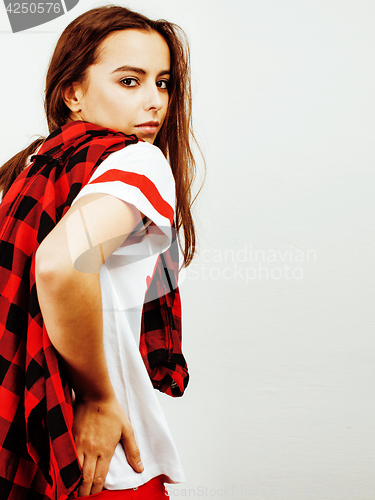 Image of young pretty teenage hipster girl posing emotional happy smiling on white background, lifestyle people concept 