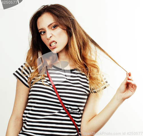 Image of young pretty teenage hipster girl posing emotional happy smiling on white background, lifestyle people concept closeup