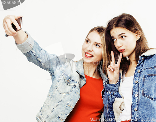 Image of best friends teenage girls together having fun, posing emotional on white background, besties happy smiling, lifestyle people concept close up