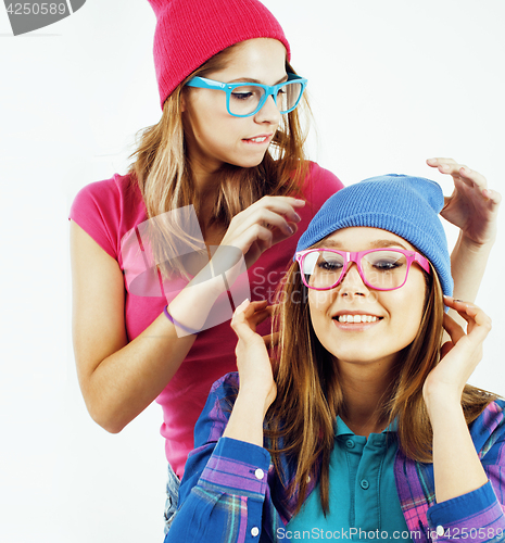 Image of best friends teenage girls together having fun, posing emotional on white background, besties happy smiling, lifestyle people concept close up