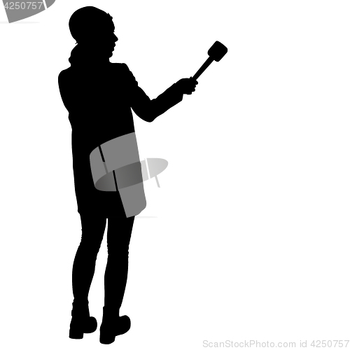 Image of Sound technician with microphone in hand. Silhouettes on white background