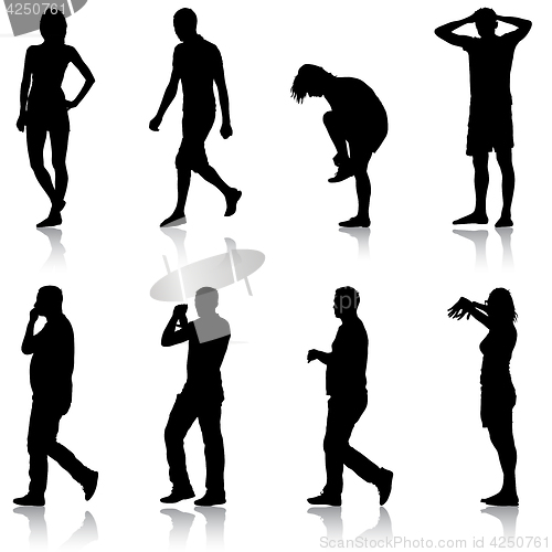 Image of Black silhouette group of people standing in various poses