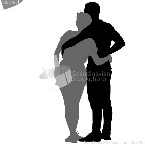 Image of Silhouette man and woman walking hand in hand