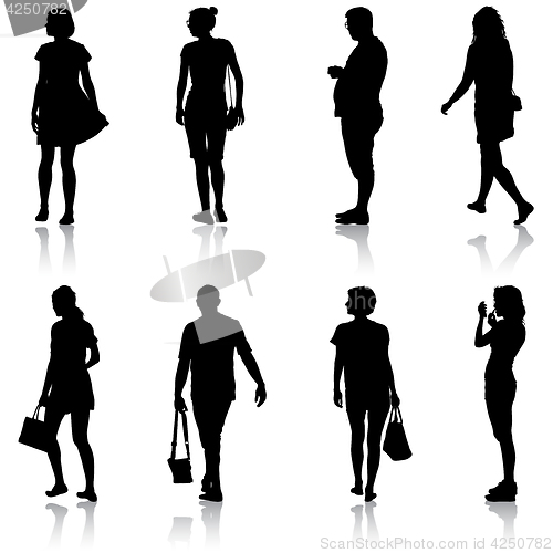 Image of Black silhouette group of people standing in various poses