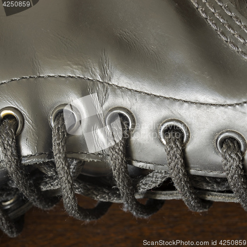 Image of Black leather boot with laces