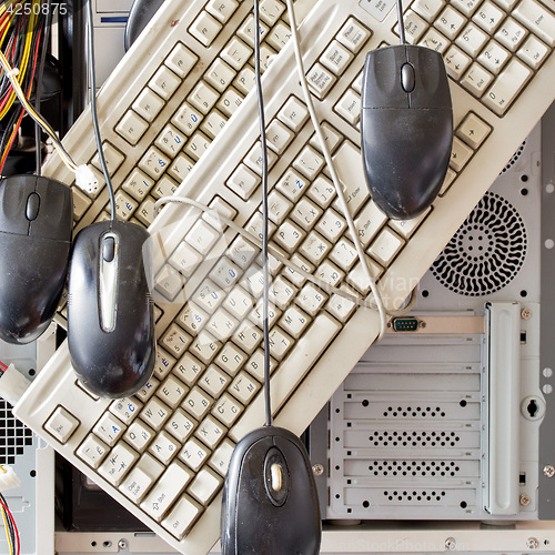 Image of old computers and computer accessories for electronic recycling