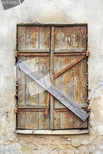 Image of abandoned grunge cracked stucco wall