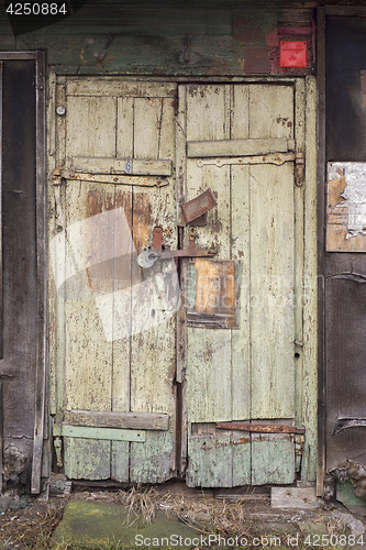 Image of grunge wooden plank door