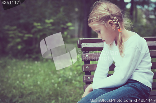 Image of Portrait of sad little girl