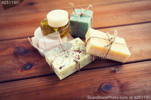 Image of close up of handmade soap bars on wood