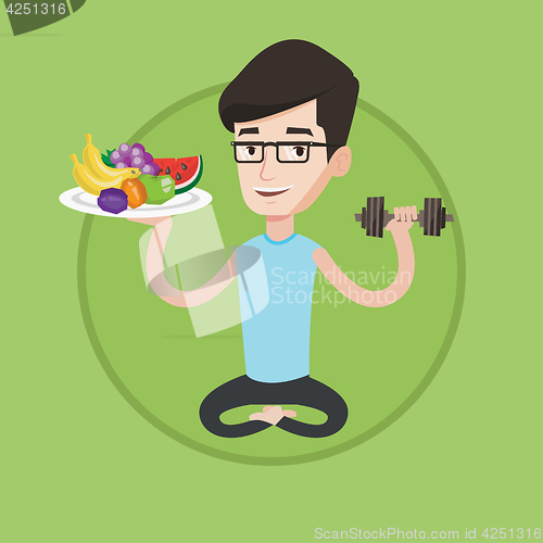 Image of Healthy man with fruits and dumbbell.