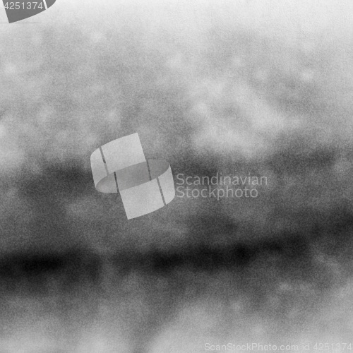 Image of Abstract black and white grained film strip