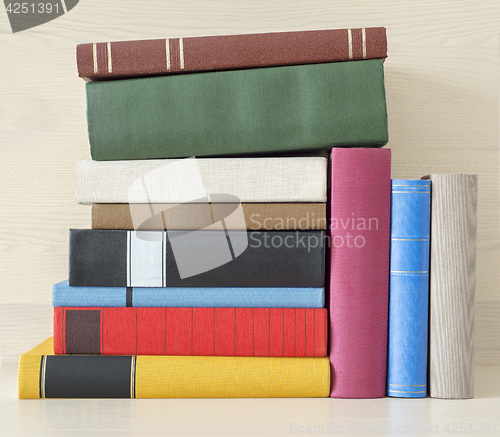 Image of stack of books in the bookself