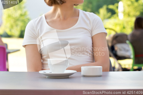 Image of cup of coffee on a table at the cafe