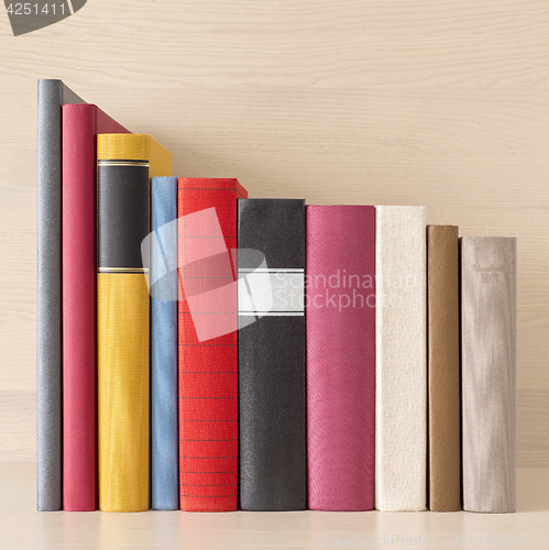 Image of stack of books in the bookself