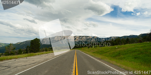 Image of Open Road Mountain Background Journey Two Lane Blacktop Highway