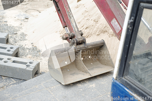 Image of Excavator at building site