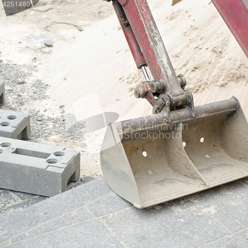 Image of Excavator at building site