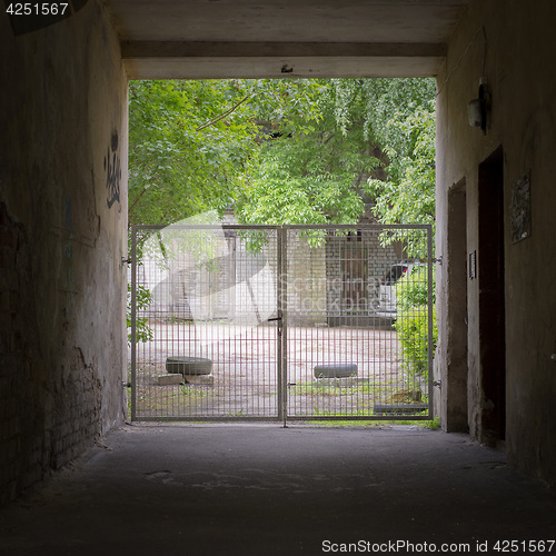 Image of Tunnel and gates to the yard