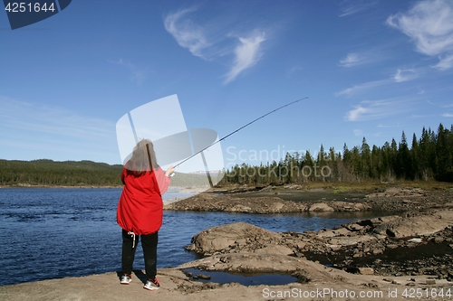 Image of Woman fishing