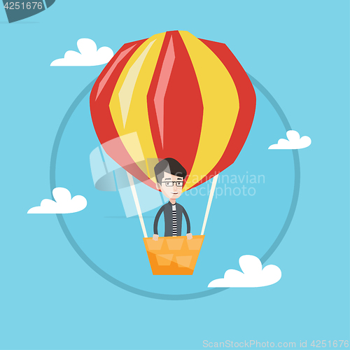 Image of Man flying in hot air balloon vector illustration.