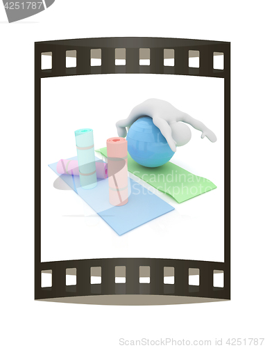 Image of 3d man on a karemat with fitness ball. 3D illustration. The film