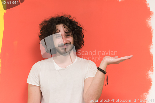 Image of young man with funny hair over color background