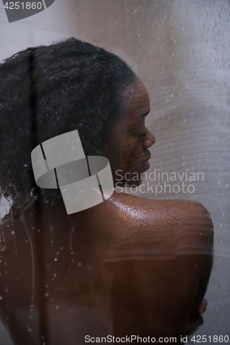 Image of African American woman in the shower