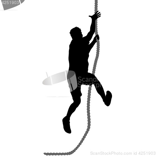 Image of Black silhouette Mountain climber climbing a tightrope up on hands