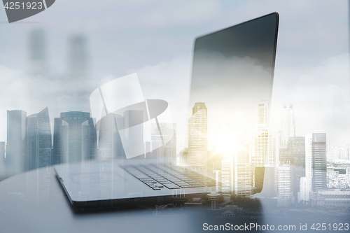 Image of laptop computer on office table