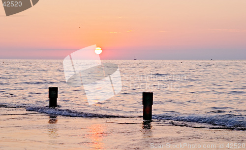 Image of Spectacular sea sunset from the beach of the naturist camping of Cervar Porec (Parenzo), Istria, Croatia