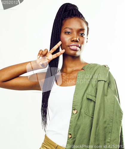 Image of young pretty african-american girl posing cheerful emotional on white background isolated, lifestyle people concept 