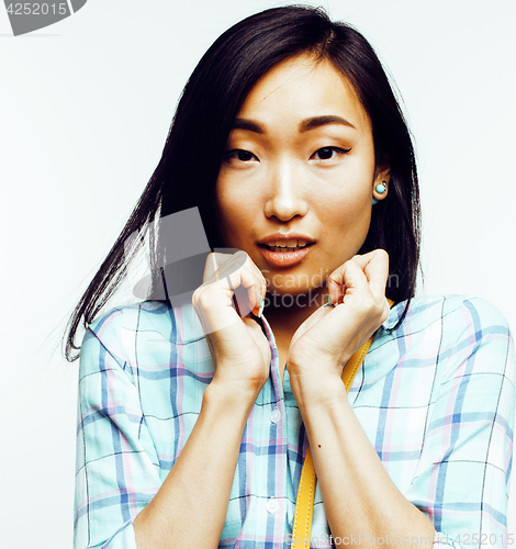 Image of young pretty asian woman posing cheerful emotional isolated on white background, lifestyle people concept