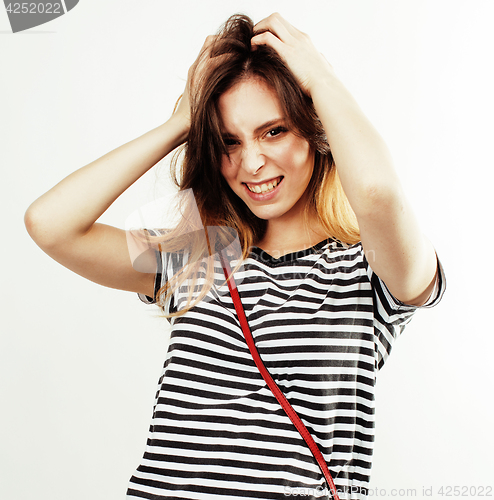 Image of young pretty teenage hipster girl posing emotional happy smiling on white background, lifestyle people concept closeup