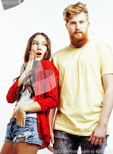 Image of young pretty teenage couple, hipster guy with his girlfriend happy smiling and hugging isolated on white background, lifestyle people concept 