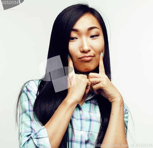 Image of young pretty asian woman posing cheerful emotional isolated on white background, lifestyle people concept