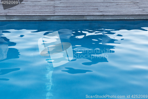 Image of close up of outdoor swimming pool blue water