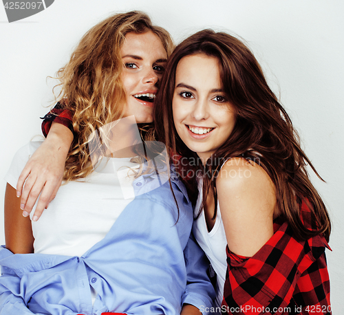 Image of best friends teenage girls together having fun, posing emotional on white background, besties happy smiling, lifestyle people concept 