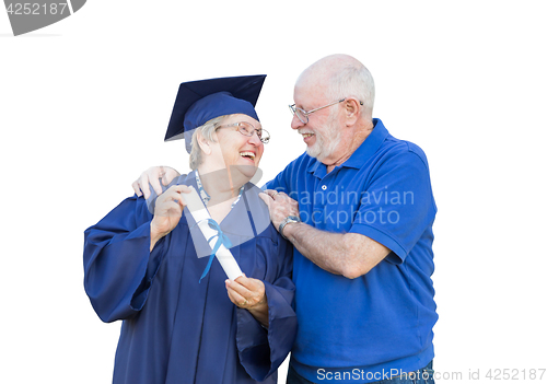 Image of Senior Adult Woman Graduate in Cap and Gown Being Congratulated 