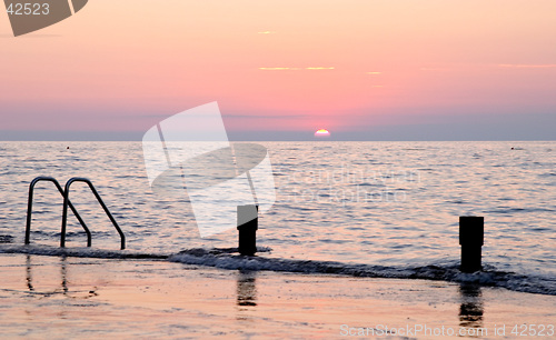 Image of Spectacular sea sunset from the beach of the naturist camping of Cervar Porec (Parenzo), Istria, Croatia