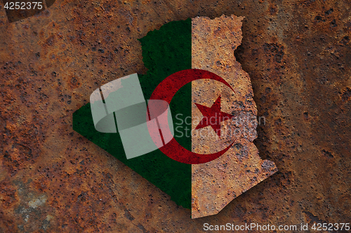 Image of Map and flag of Algeria on rusty metal