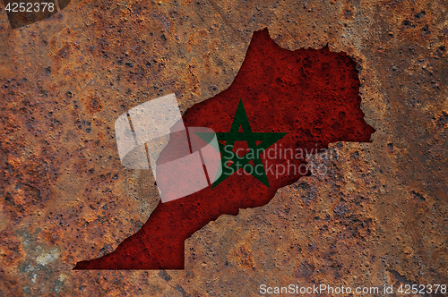 Image of Map and flag of Morocco on rusty metal