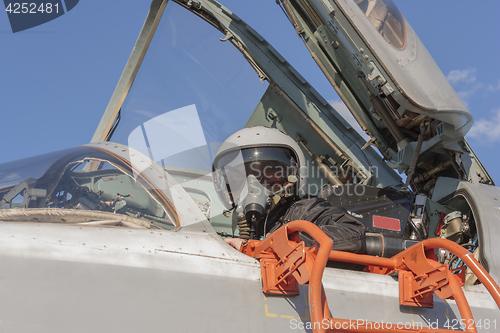 Image of Military pilot in the cockpit of a jet aircraft