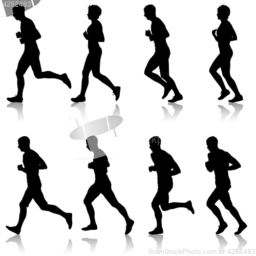 Image of Set of silhouettes. Runners on sprint, men and woman