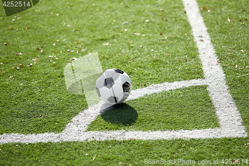 Image of soccer ball on football field